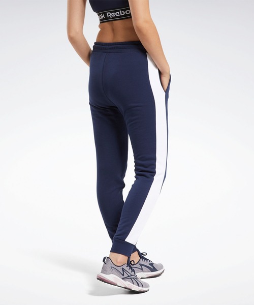 Reebok(リーボック)の「トレーニング エッセンシャルズ リニア ロゴ パンツ / Training Essentials Linear Logo Pants(スウェットパンツ・レディース・ブラック/ネイビー・SMALL/MEDIUM/LARGE/X-LARGE/X-SMALL)」の7枚目の写真