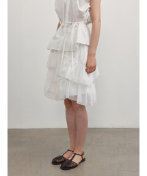 GANISONG（ガニソン）の「ポルンラッフルスカート_ホワイト（スカート）」