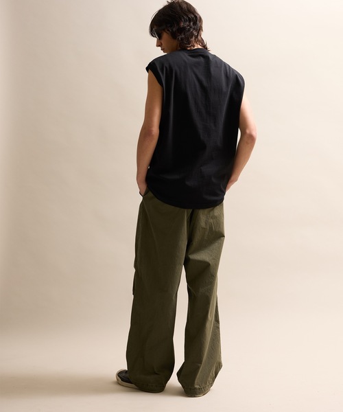 NUMBER (N)INE(ナンバーナイン)の「BASIC HEM PRINTED SLEEVELESS SHIRT / ベーシック ワンポイント ロゴプリント ノースリーブ クルーネックシャツ(タンクトップ・メンズ・グレー/ホワイト/ブラック・M/L/XL)」の10枚目の写真