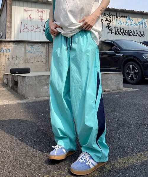 NOWLE（ノウル）の「【NOWLE】サイドライン ワイド シャカシャカ パンツ（その他パンツ・メンズ・イエロー/サックスブルー・LARGE/MEDIUM/SMALL/X-LARGE）」の6枚目の写真