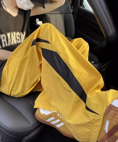 NOWLE（ノウル）の「【NOWLE】サイドライン ワイド シャカシャカ パンツ（その他パンツ・メンズ・イエロー/サックスブルー・LARGE/MEDIUM/SMALL/X-LARGE）」の9枚目の写真