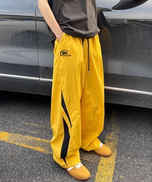 NOWLE（ノウル）の「【NOWLE】サイドライン ワイド シャカシャカ パンツ（その他パンツ・メンズ・イエロー/サックスブルー・LARGE/MEDIUM/SMALL/X-LARGE）」の16枚目の写真