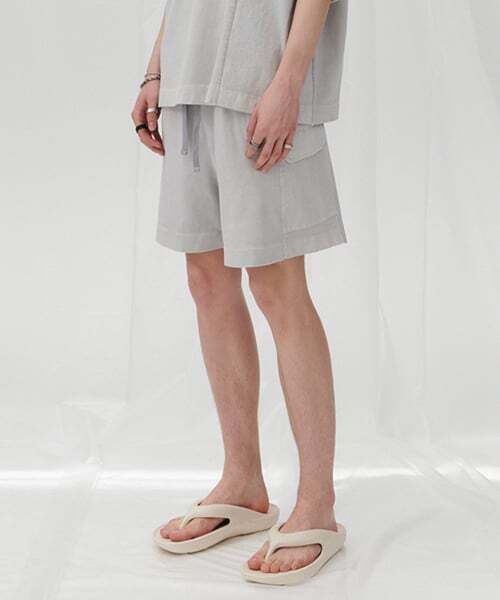 DNSR(ディーエヌエスアール)の「フラップピグメントハーフパンツ(その他パンツ・メンズ・その他・L/M)」の1枚目の写真