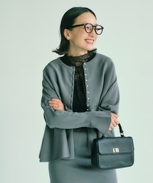 【Du noir】スポンディッシュペプラムパールカーディガン