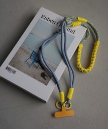 Mela（メラ）の「カラフル編み込みスマホショルダーストラップ（スマホグッズ）」