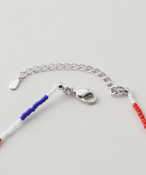 IENA LA BOUCLE(イエナラブークル)の「STEEN スティン tricolor smile ネックレス 26SS-13(ネックレス・レディース・レッド・FREE)」の5枚目の写真