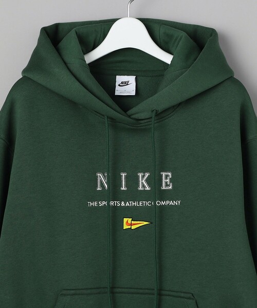 NIKE(ナイキ)の「NIKE/ナイキ フラッグプルオーバーフーディー/ナイキ スポーツウェア オーバーサイズド フリース パーカー(パーカー・レディース・ブラック/ホワイト/グリーン・MEDIUM)」の14枚目の写真