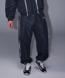 BORN TO WIN（ボーントゥウィン）の「WOVEN PIPING TRACK PANTS [NAVY]（スウェットパンツ）」