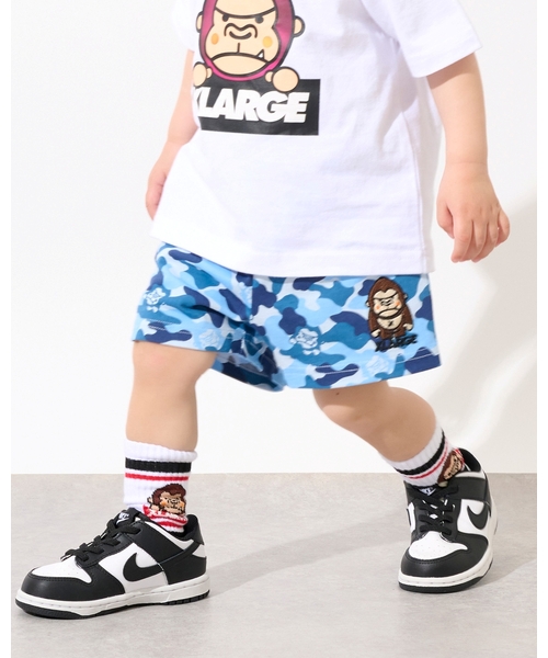 XLARGE KIDS(エクストララージキッズ)の「ファニーゴリラカモ総柄 ショートパンツ(その他パンツ・キッズ・ブルー/グリーン・120cm/140cm/130cm/90cm/110cm/100cm/80cm)」の1枚目の写真