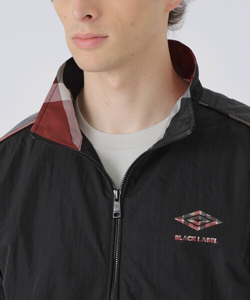 BLACK LABEL CRESTBRIDGE(ブラックレーベル・クレストブリッジ)の「【WEB・一部店舗限定】【UMBRO】ワッシャーナイロンスタンドブルゾン(ブルゾン・メンズ・ブラック・XL/L/M)」の6枚目の写真