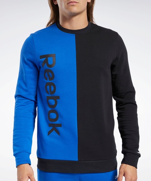 Reebok(リーボック)の「トレーニング エッセンシャルズ リニア ロゴ スウェットシャツ / Training Essentials Linear Logo Sweatshirt(スウェット・メンズ・ブラック/ブルー・SMALL/MEDIUM/XX-LARGE/X-LARGE/LARGE/XXX-LARGE)」の1枚目の写真