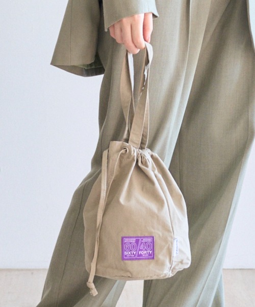 PR01.(ピーアールワン)の「「N/ordinary」W DRAW STRING POUCH(ドラムバッグ・メンズ・ベージュ/イエロー/パープル/ブラック/カーキ/レオパード・FREE)」の1枚目の写真