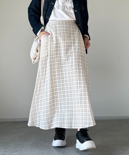 un dix cors（アンディコール）の「サッカーチェックスカート
