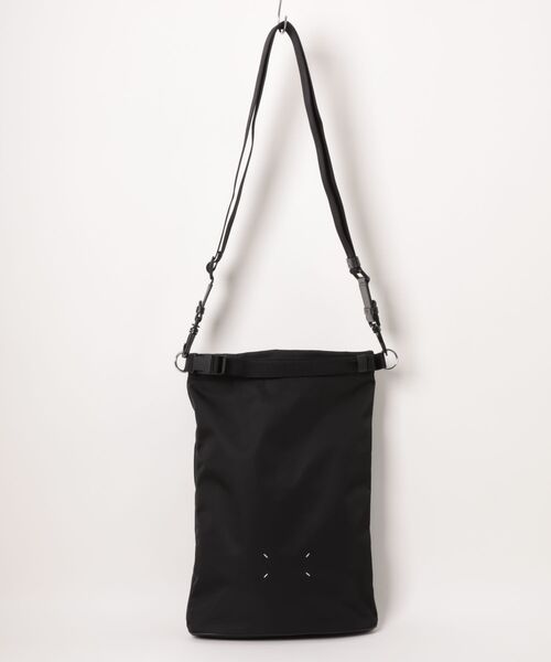 Maison Margiela(メゾンマルジェラ)の「Maison Margiela HIGH TECH ROLL UP BACKPACK(バックパック/リュック・メンズ・ブラック・FREE)」の1枚目の写真