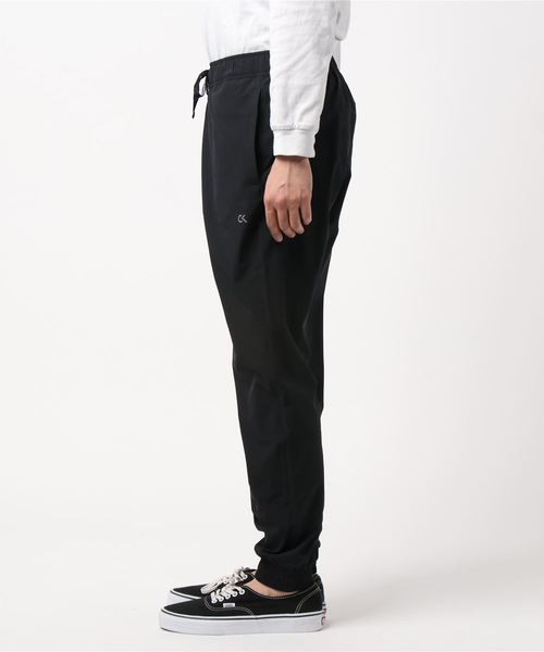 CALVIN KLEIN PERFORMANCE（カルバンクラインパフォーマンス）の「カバー ウーブン スウェット パンツ（スウェットパンツ・メンズ・ブラック/グレー系その他・M/S/L）」の3枚目の写真
