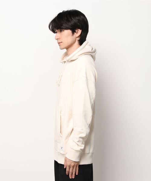 Reebok(リーボック)の「レズミルズ ノンダイ コットン フーディー(パーカー・メンズ・オフホワイト・XX-LARGE/X-SMALL/SMALL/LARGE/XXX-LARGE/X-LARGE/MEDIUM)」の2枚目の写真