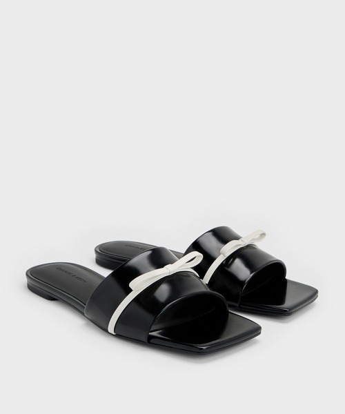 CHARLES & KEITH(チャールズ & キース)の「ボウ スライドサンダル(サンダル・レディース・ブラック系その他7/ホワイト・26.5cm/25.5cm/25cm/24.5cm/23.5cm/23cm/22.5cm)」の7枚目の写真