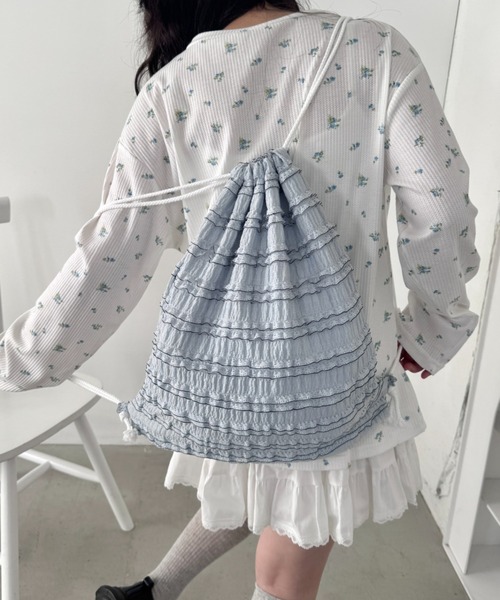 Loueme(ルエム)の「ホイップレースフリルナップサック(バックパック/リュック・レディース・オフホワイト/ライトブルー/ブラック・FREE)」の1枚目の写真