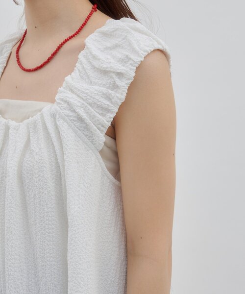 DISCOAT（ディスコート）の「【umm.】肩ギャザーリボンチュニック（シャツ/ブラウス・レディース・オフホワイト/ブラック・FREE）」の7枚目の写真