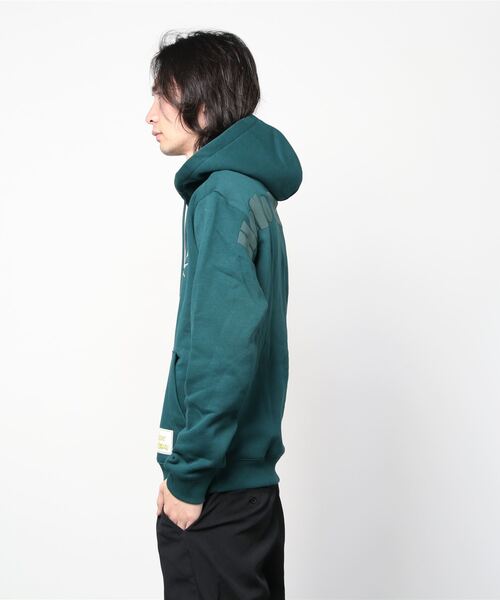Reebok(リーボック)の「フリントストーン グレート ガズー グラフィック フーディー / THE FLINTSTONES Great Gazoo Graphic Hoodie /(スウェット・メンズ・ダークグリーン・X-SMALL/XX-LARGE/LARGE/SMALL/XXX-LARGE/MEDIUM/X-LARGE)」の6枚目の写真