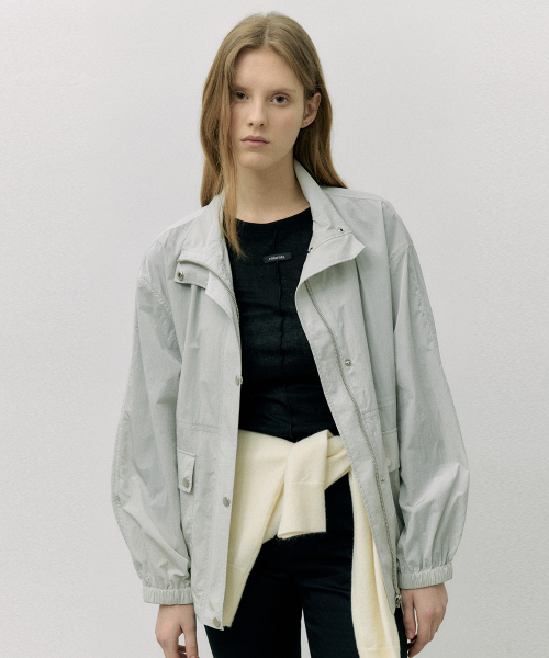 ROLAROLA(ロラロラ)の「HIGH NECK WIND JACKET GRAY(ナイロンジャケット・レディース・グレー・FREE)」の1枚目の写真