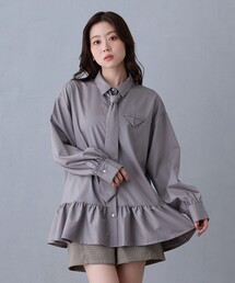 ペプラムデザインブラウス