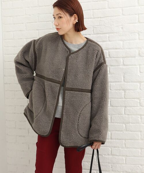 SHOO・LA・RUE(シューラルー)の「◆フェイクムートン ボア リバーシブルジャケット(ノーカラージャケット・レディース・サンドベージュ/チャコールグレー/アイボリー・04/02/03)」の12枚目の写真