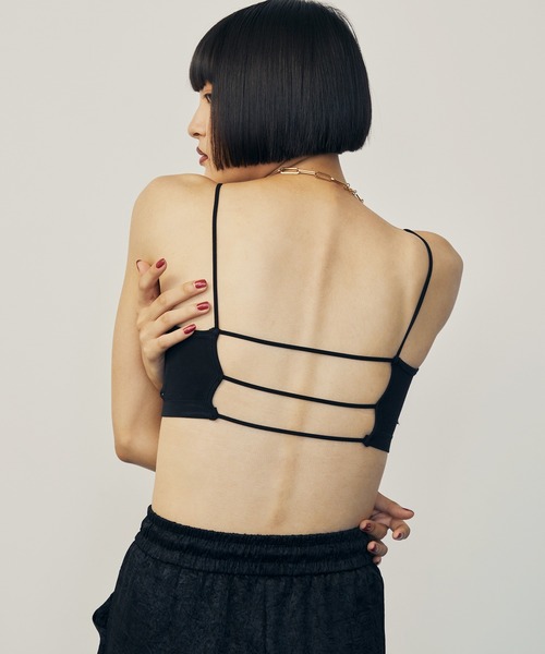 d.i.a/ゼブラコンビオープンバックカットソー uyu.（ウユ）の「バックオープンバイカラーブラトップ【uyu