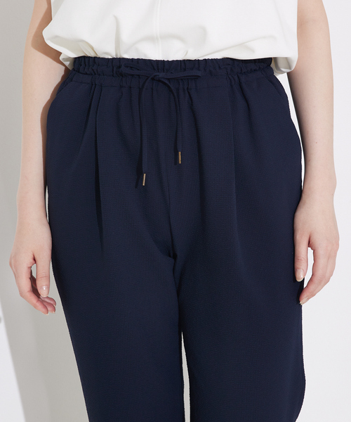 qualite(カリテ)の「シアサッカーテーパードパンツ(その他パンツ・レディース・ベージュ/ネイビー・36/38)」の18枚目の写真