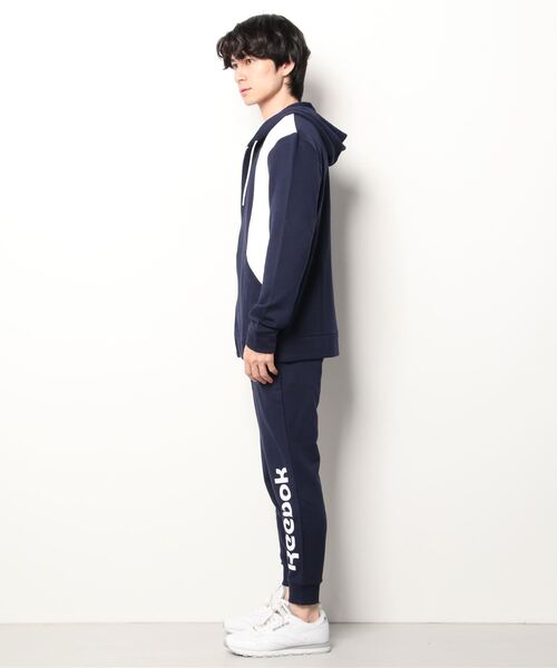 Reebok(リーボック)の「トレーニング エッセンシャルズ リニア ロゴ トラックスーツ / Training Essentials Linear Logo Track Suit(セットアップ・メンズ・ネイビー・SMALL/MEDIUM/LARGE/X-LARGE/XX-LARGE/XXX-LARGE/X-SMALL)」の11枚目の写真