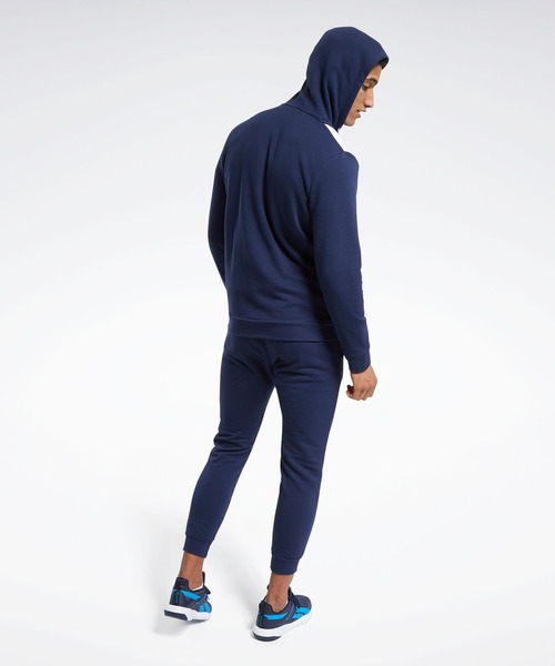 Reebok(リーボック)の「トレーニング エッセンシャルズ リニア ロゴ トラックスーツ / Training Essentials Linear Logo Track Suit(セットアップ・メンズ・ネイビー・SMALL/MEDIUM/LARGE/X-LARGE/XX-LARGE/XXX-LARGE/X-SMALL)」の6枚目の写真