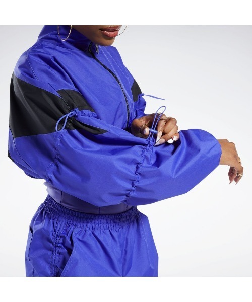 Reebok(リーボック)の「カーディB ウーブン ジャケット / Cardi B Woven Jacket(ナイロンジャケット・レディース・ベージュ/ホワイト/パープル・SMALL/MEDIUM/LARGE/X-LARGE/J/L/J/S/J/M/OT)」の10枚目の写真