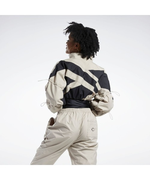 Reebok(リーボック)の「カーディB ウーブン ジャケット / Cardi B Woven Jacket(ナイロンジャケット・レディース・ベージュ/ホワイト/パープル・SMALL/MEDIUM/LARGE/X-LARGE/J/L/J/S/J/M/OT)」の6枚目の写真