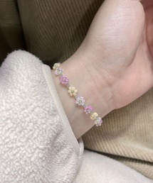 TONE SELECT GOODS（トーンセレクトグッズ）の「【urge select】フラワー ビーズ ブレスレット（ブレスレット・レディース・パープル系）」