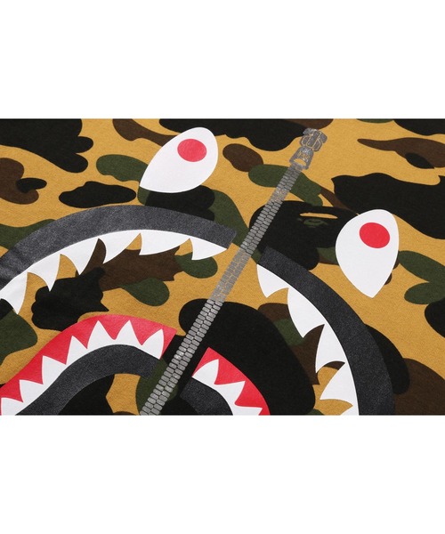 A BATHING APE(アベイシングエイプ)の「1ST CAMO SHARK TEE(Tシャツ/カットソー・キッズ・イエロー/グリーン/オレンジ・90/110/130/140/100/120)」の8枚目の写真