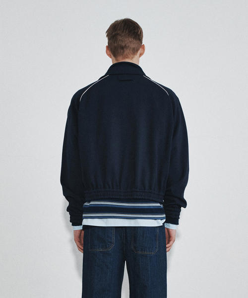 HEUTE（ホイテ）の「OLIVER TRACK JACKET (NAVY)（ナイロンジャケット・メンズ・ネイビー・MEDIUM）」の4枚目の写真