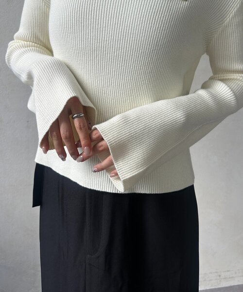 Thevon(ゼボン)の「アシメホルター袖フレアニット(ニット/セーター・レディース・ブラウン/アイボリー/オレンジ・FREE)」の9枚目の写真