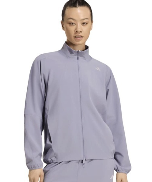 adidas(アディダス)の「アディダス adidas トレーニング エッセンシャルズ プラス ルーズフィット ストレッチ ウーブン ジャケット(ジャージ・レディース・パープル・M/L)」の1枚目の写真