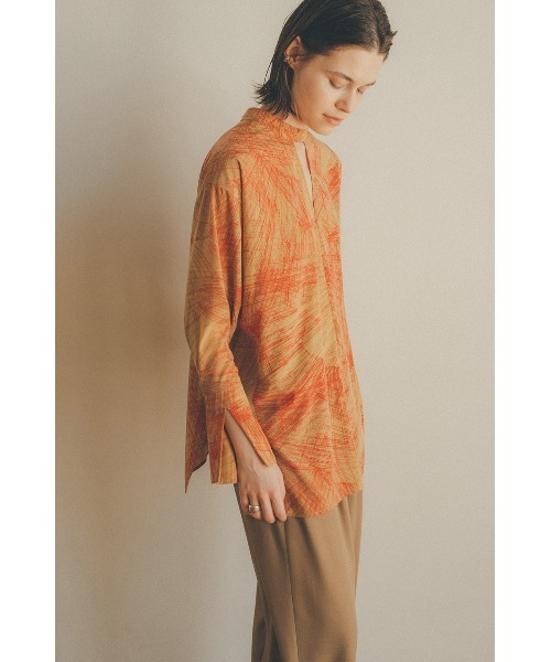 CLANE(クラネ)の「RADIAL LINE DOUBLE FACE BLOUSE(シャツ/ブラウス・レディース・レッド/アイボリー・2/1)」の1枚目の写真