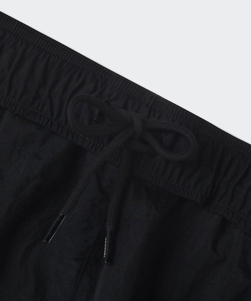 Reebok(リーボック)の「ブラックアイパッチ ウーブン ショーツ / BlackEye Patch Woven Shorts(その他パンツ・メンズ・ダークグリーン/ブラック・X-SMALL/X-LARGE/XX-LARGE/SMALL/MEDIUM/LARGE/XXX-LARGE)」の5枚目の写真