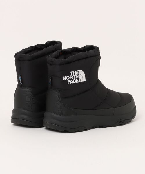 THE NORTH FACE(ザノースフェイス)の「THE NORTH FACE ザ・ノースフェイス NUPTSE BOOTIE WP LOGO SHORT ARCTIC GRIP 防水透湿 保温 ガラス繊維配合ソール メンズブーツ(ヌプシブーティWPロゴショートアークティックグリップ) NF52485 KW ブラック/ホワイト(ブーツ・メンズ・ブラック×ホワイト・26.0cm/27.0cm/28.0cm/29.0cm)」の2枚目の写真