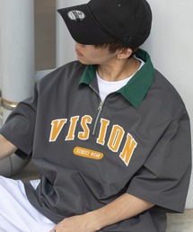 VISION STREET WEAR（ヴィジョンストリートウェア）の「【VISION STREET WEAR／ヴィジョンストリートウェア】クレリックハーフジッププルオーバー/アーチロゴ/ワッペン/ビッグシルエット（シャツ/ブラウス・レディース）」