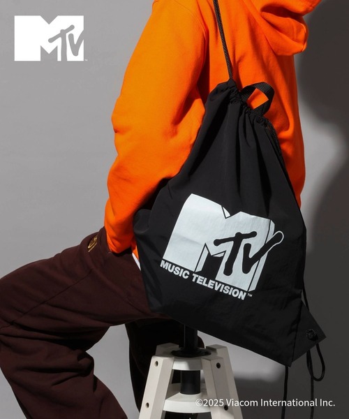 GLOBAL WORK(グローバルワーク)の「MTVコラボ/ナップサック/一部店舗限定/612529(バックパック/リュック・メンズ・ブラック/オレンジ系その他4/ミント・FREE)」の4枚目の写真