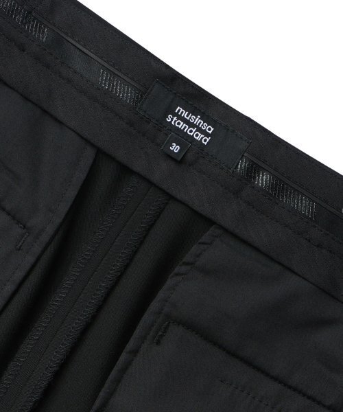MUSINSA STANDARD（ムシンサスタンダード）の「リバースツージョーセミバルーン隠しバンディングスラックス[ブラック]（スラックス・メンズ・その他・26/27）」の4枚目の写真
