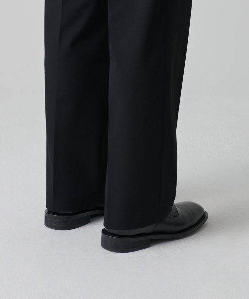MUSINSA STANDARD（ムシンサスタンダード）の「リバースツージョーセミバルーン隠しバンディングスラックス[ブラック]（スラックス・メンズ・その他・26/27）」の2枚目の写真