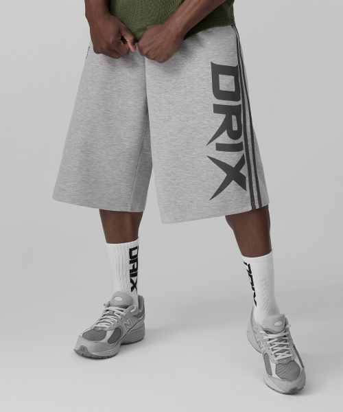 DRIX(ドリックス)の「トラックライングラフィックバミューダスウェットパンツ_メランジグレー(その他パンツ・メンズ・その他・LARGE/X-LARGE)」の9枚目の写真