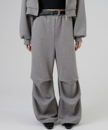 apres jour mignon（アプレジュールミニョン）の「キラキラパラシュートパンツ（スウェットパンツ）」