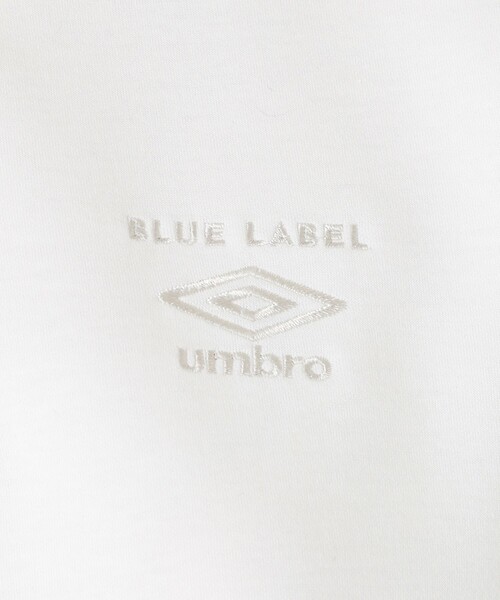 BLUE LABEL CRESTBRIDGE(ブルーレーベルクレストブリッジ)の「【umbro】ハーフジッププルオーバー(ポロシャツ・レディース・オフホワイト/ブラック・38)」の8枚目の写真