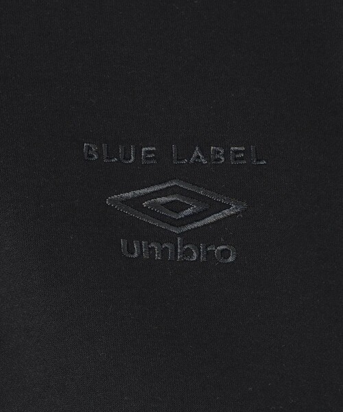 BLUE LABEL CRESTBRIDGE(ブルーレーベルクレストブリッジ)の「【umbro】ハーフジッププルオーバー(ポロシャツ・レディース・オフホワイト/ブラック・38)」の15枚目の写真