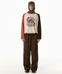 TEKET（テケット）の「Jingle Words Track Pants Brown（スウェットパンツ）」